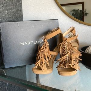 Never worn, Marciano tan fringe heels.